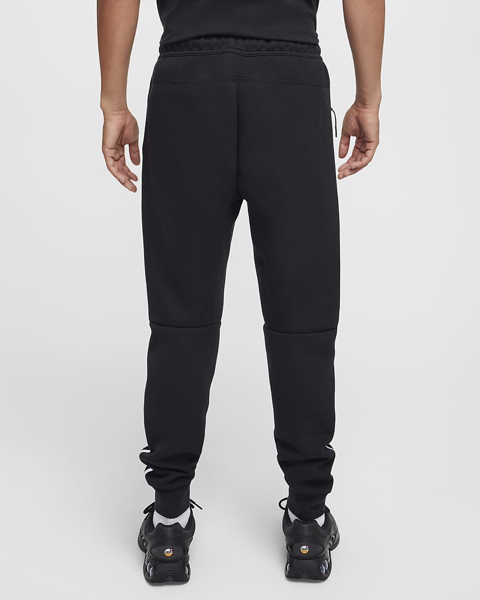 Nike Tech joggingbroek van fleece met reflecterende details voor heren. Nike NL